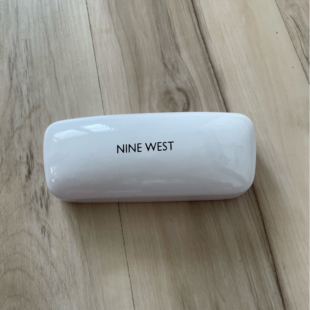 Nine West hard glass case.